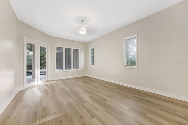5103 Twin Creeks Dr, Valrico, FL 33596 - unfurnished room with a ceiling fan and light wood-style flooring