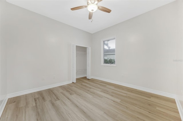 5103 Twin Creeks Dr, Valrico, FL 33596 - spare room with light wood-type flooring and a ceiling fan