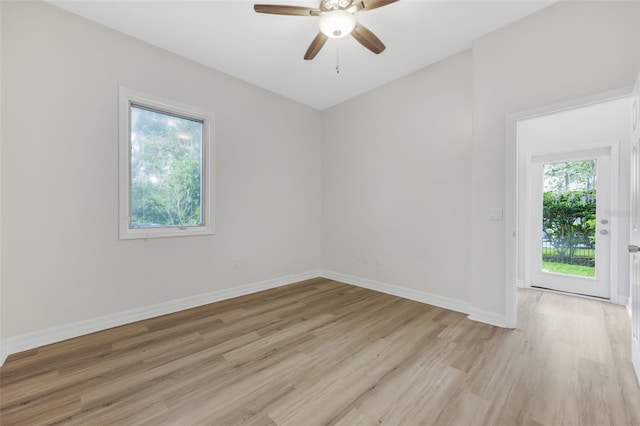 5103 Twin Creeks Dr, Valrico, FL 33596 - spare room featuring light wood-style floors and ceiling fan
