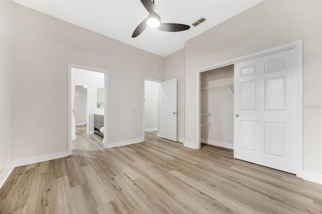 5103 Twin Creeks Dr, Valrico, FL 33596 - unfurnished bedroom with light wood-type flooring, a closet, and ceiling fan