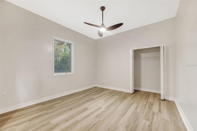 5103 Twin Creeks Dr, Valrico, FL 33596 - unfurnished bedroom with light wood-style floors, a closet, and a ceiling fan
