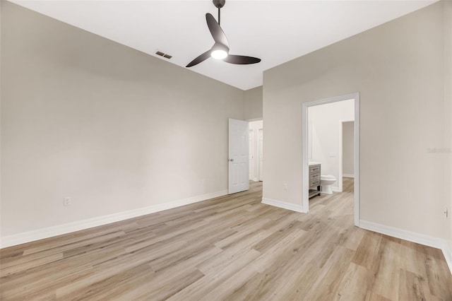 5103 Twin Creeks Dr, Valrico, FL 33596 - unfurnished bedroom featuring light wood-type flooring, ensuite bath, and a ceiling fan