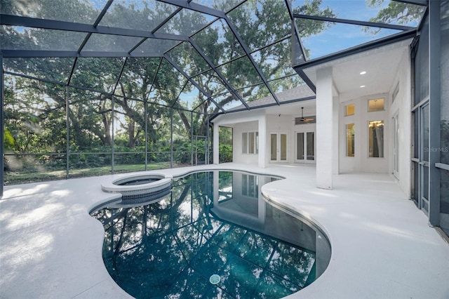 5103 Twin Creeks Dr, Valrico, FL 33596 - view of swimming pool with a patio, a pool with connected hot tub, ceiling fan, and a lanai