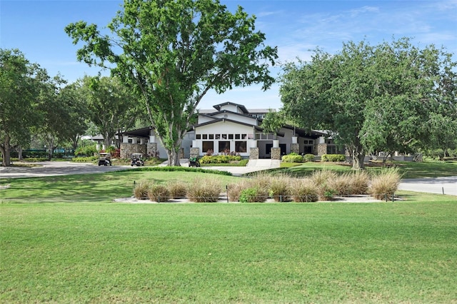 5103 Twin Creeks Dr, Valrico, FL 33596 - view of home's community with a yard