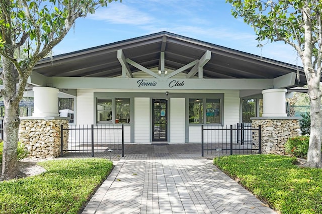 5103 Twin Creeks Dr, Valrico, FL 33596 - entrance to property featuring a porch and stone siding