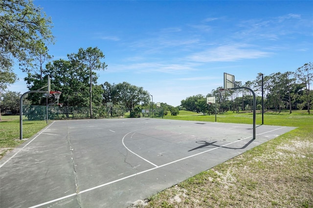 5103 Twin Creeks Dr, Valrico, FL 33596 - view of basketball court featuring community basketball court and a yard