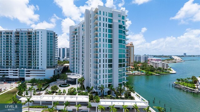555 Quay Cmn Unit 1801, Sarasota, FL 34236 - view of building exterior featuring a water view and a view of city