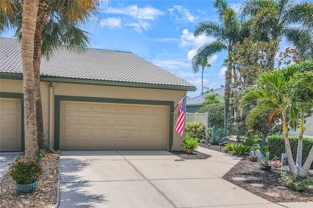 8579 54th Avenue Cir E, Bradenton, FL 34211 - garage with concrete driveway