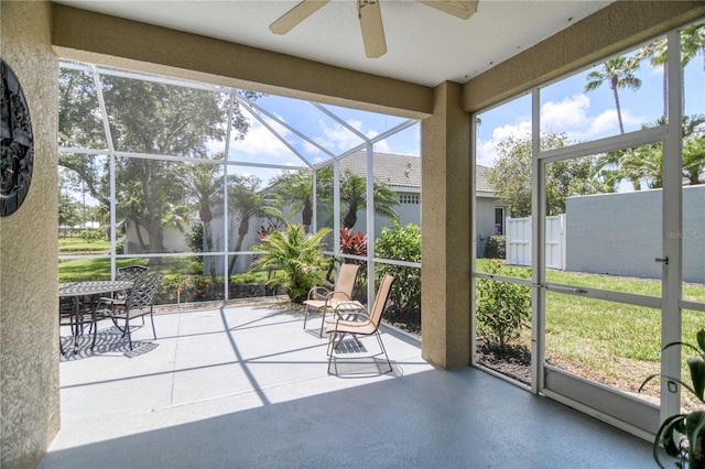 8579 54th Avenue Cir E, Bradenton, FL 34211 - unfurnished sunroom with ceiling fan