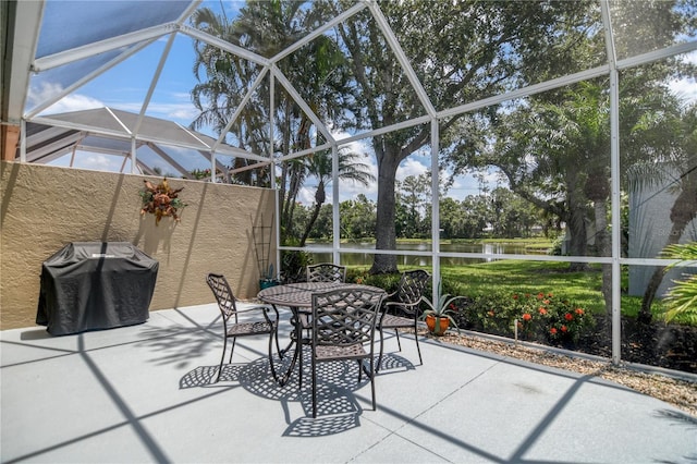 8579 54th Avenue Cir E, Bradenton, FL 34211 - sunroom with a water view and outdoor dining area