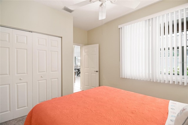 8579 54th Avenue Cir E, Bradenton, FL 34211 - bedroom with a closet, ceiling fan, and vaulted ceiling