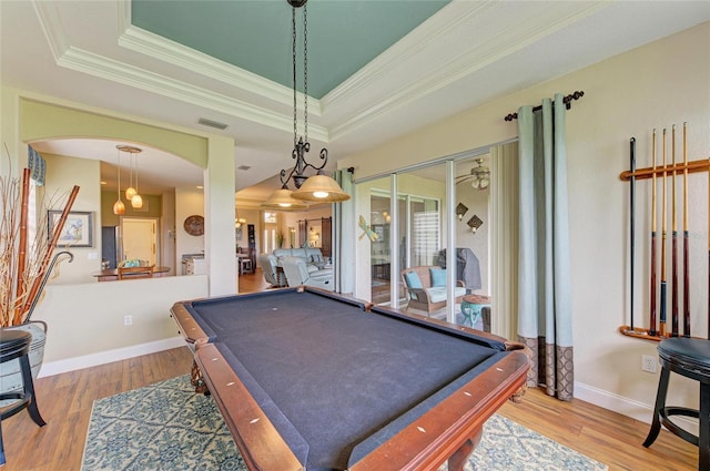 8906 Stone Harbour Loop, Bradenton, FL 34212 - rec room with a raised ceiling, ornamental molding, wood finished floors, arched walkways, and billiards table