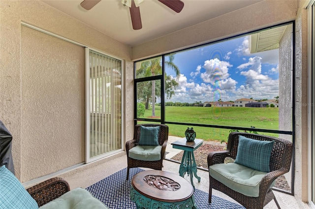 8906 Stone Harbour Loop, Bradenton, FL 34212 - sunroom / solarium featuring a ceiling fan