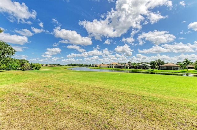 8906 Stone Harbour Loop, Bradenton, FL 34212 - view of green lawn featuring a water view and a residential view