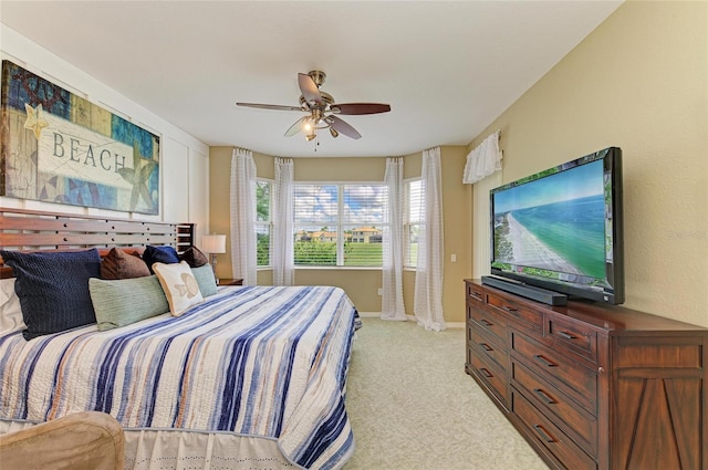 8906 Stone Harbour Loop, Bradenton, FL 34212 - bedroom with light colored carpet and ceiling fan