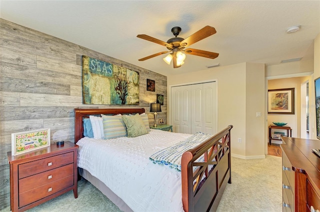 8906 Stone Harbour Loop, Bradenton, FL 34212 - bedroom with a closet, wood walls, light colored carpet, and ceiling fan