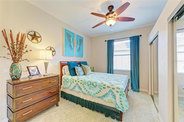 8906 Stone Harbour Loop, Bradenton, FL 34212 - bedroom with light carpet and a ceiling fan