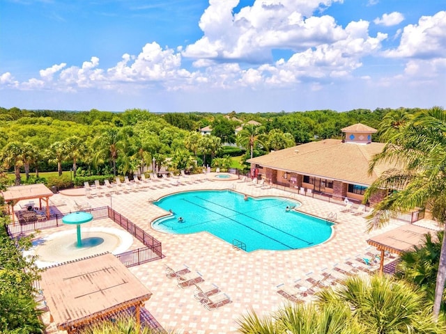 8906 Stone Harbour Loop, Bradenton, FL 34212 - community pool with a community hot tub and a patio