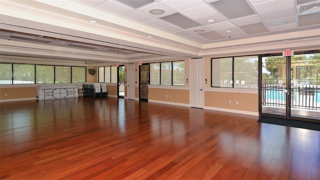 8906 Stone Harbour Loop, Bradenton, FL 34212 - spare room with a raised ceiling, wood finished floors, and healthy amount of natural light