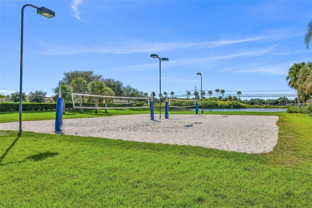 8906 Stone Harbour Loop, Bradenton, FL 34212 - view of community featuring volleyball court, a yard, and a water view