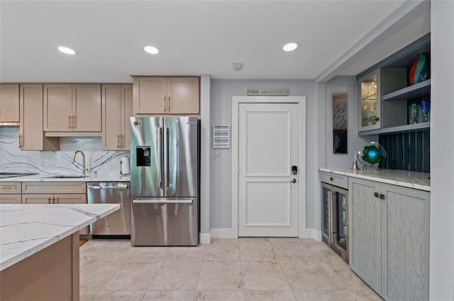 5806 Gulf Dr Unit 201S, Holmes Beach, FL 34217 - kitchen featuring stainless steel appliances, decorative backsplash, light stone counters, recessed lighting, and open shelves