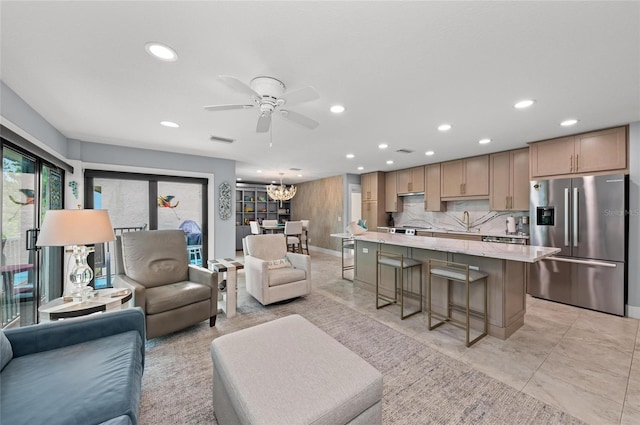 5806 Gulf Dr Unit 201S, Holmes Beach, FL 34217 - living room featuring recessed lighting, ceiling fan, and a chandelier