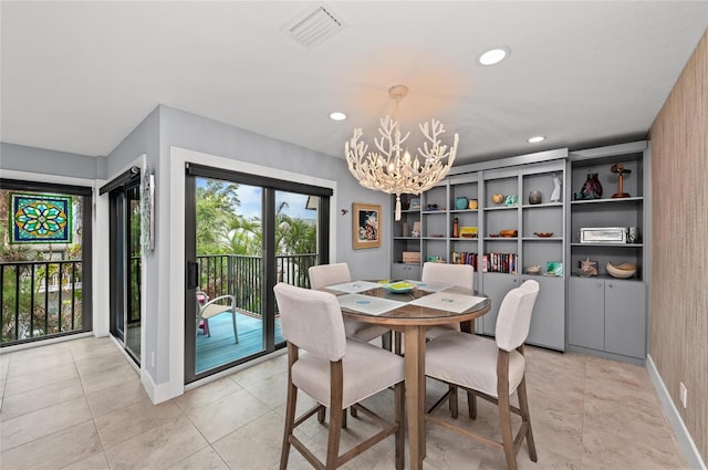5806 Gulf Dr Unit 201S, Holmes Beach, FL 34217 - dining room with a chandelier, recessed lighting, and light tile patterned floors