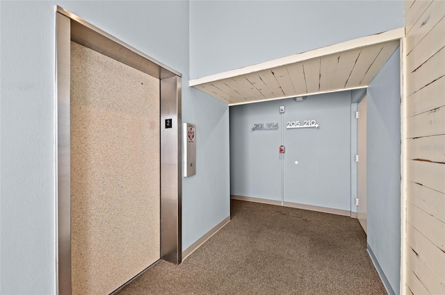 5806 Gulf Dr Unit 201S, Holmes Beach, FL 34217 - hallway featuring elevator and carpet
