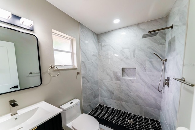 4616 34th Ave E, Bradenton, FL 34208 - bathroom with vanity, a tile shower, and recessed lighting