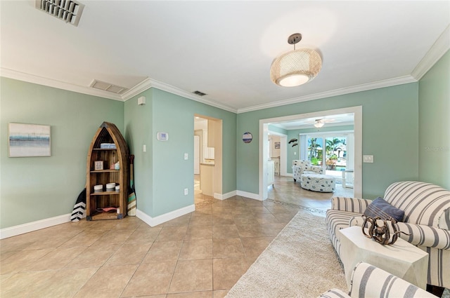 4508 Mangrove Point Rd, Bradenton, FL 34210 - living area featuring crown molding, baseboards, ceiling fan, and light tile patterned floors