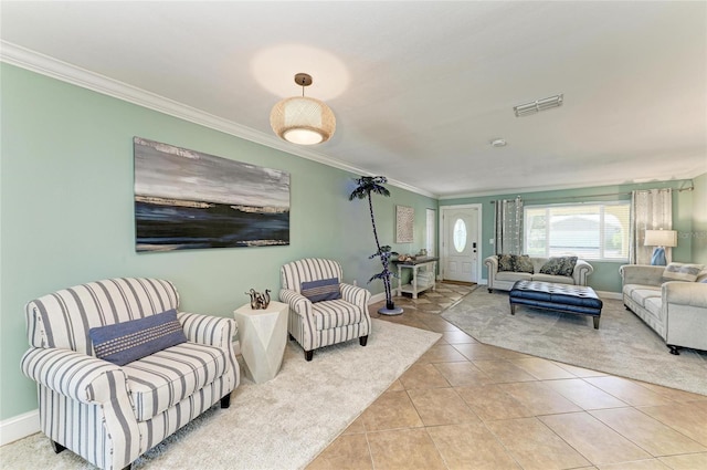4508 Mangrove Point Rd, Bradenton, FL 34210 - living room featuring crown molding, light tile patterned flooring, and baseboards
