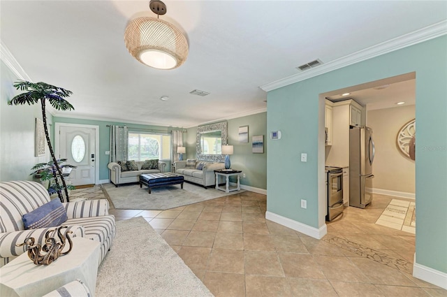 4508 Mangrove Point Rd, Bradenton, FL 34210 - living area featuring crown molding, baseboards, and light tile patterned floors