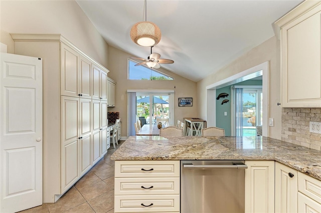4508 Mangrove Point Rd, Bradenton, FL 34210 - kitchen featuring stainless steel dishwasher, vaulted ceiling, a ceiling fan, a peninsula, and light tile patterned flooring