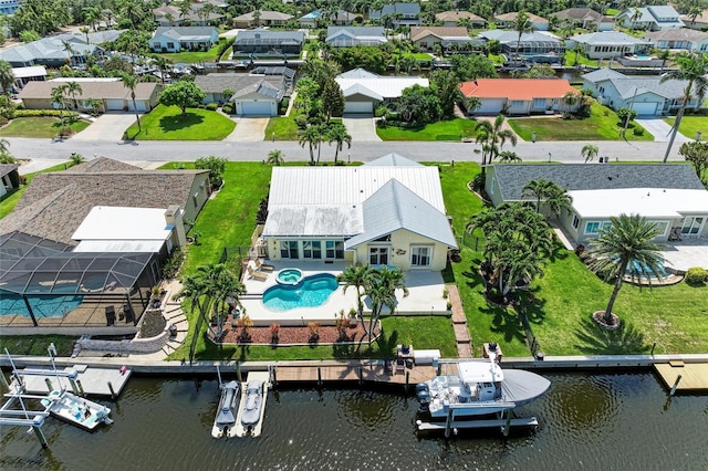 4508 Mangrove Point Rd, Bradenton, FL 34210 - aerial view of residential area with a large body of water and a pool