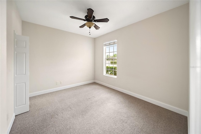 7403 Hamilton Rd, Bradenton, FL 34209 - spare room with baseboards, carpet floors, and ceiling fan