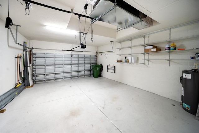 7403 Hamilton Rd, Bradenton, FL 34209 - garage with water heater and a garage door opener