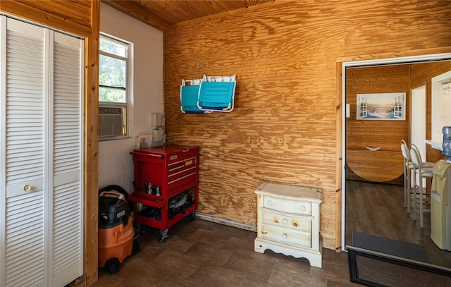 2216 Lake Shore Dr, Nokomis, FL 34275 - detailed view of wooden walls, wood ceiling, and cooling unit