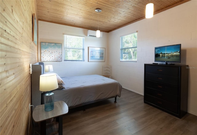 2216 Lake Shore Dr, Nokomis, FL 34275 - bedroom with a wall mounted air conditioner, wood finished floors, concrete block wall, and wood ceiling