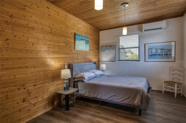 2216 Lake Shore Dr, Nokomis, FL 34275 - bedroom with an AC wall unit, wood ceiling, wooden walls, wood finished floors, and concrete block wall