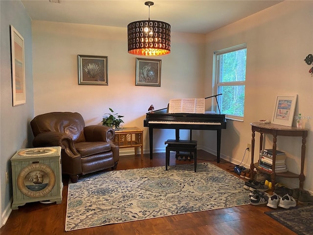 1616 NW 39th Ave, Gainesville, FL 32605 - living area featuring baseboards and wood finished floors