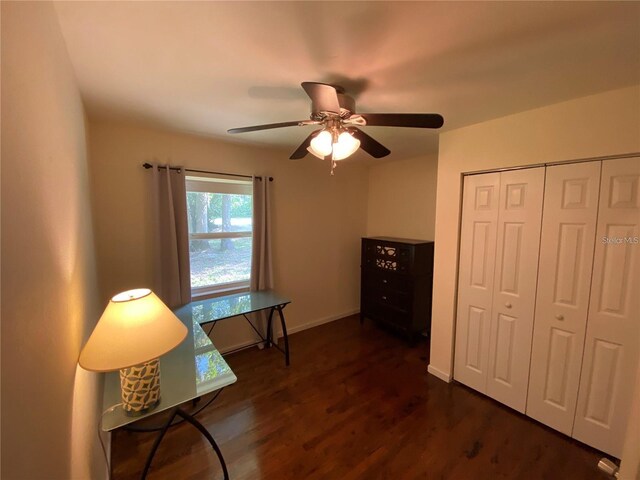 1616 NW 39th Ave, Gainesville, FL 32605 - home office with dark wood-style floors and a ceiling fan