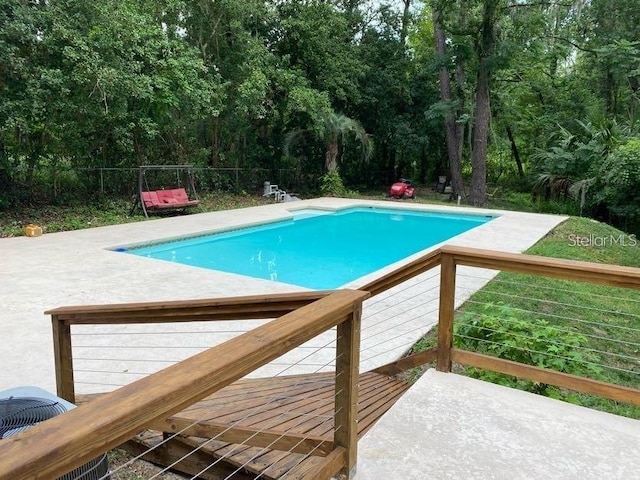 1616 NW 39th Ave, Gainesville, FL 32605 - swimming pool featuring a patio and a wooden deck