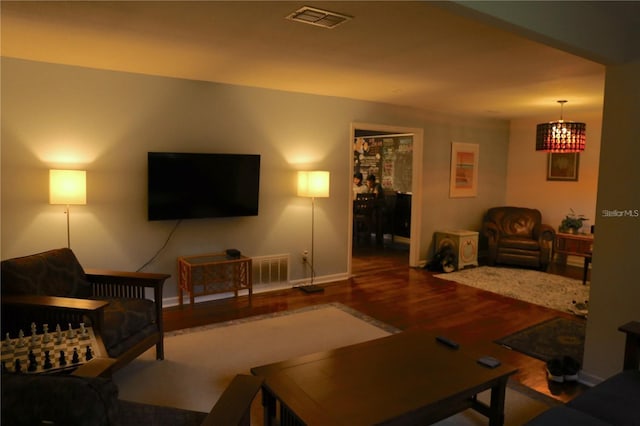 1616 NW 39th Ave, Gainesville, FL 32605 - living room featuring wood finished floors and baseboards