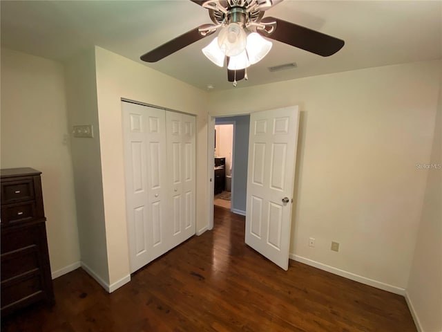 1616 NW 39th Ave, Gainesville, FL 32605 - unfurnished bedroom featuring wood finished floors, a closet, and ceiling fan