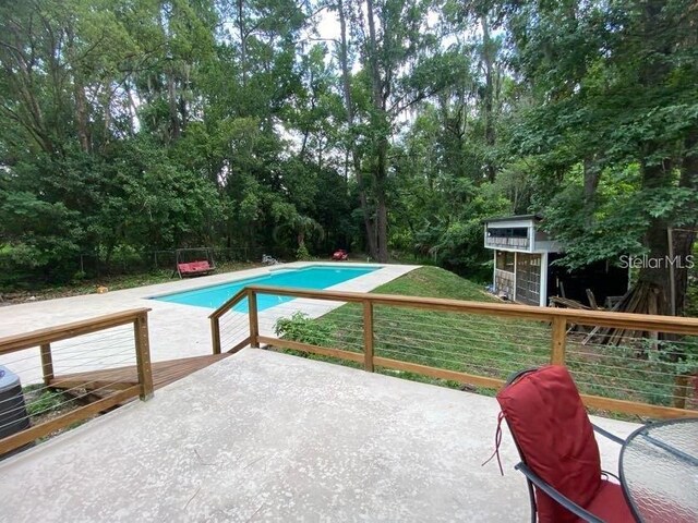 1616 NW 39th Ave, Gainesville, FL 32605 - swimming pool with a patio area