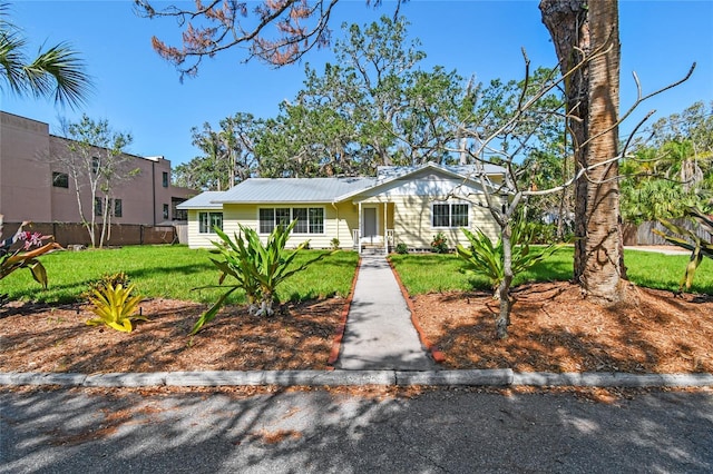 3001 Bay Shore Cir, Sarasota, FL 34234 - view of front facade featuring metal roof