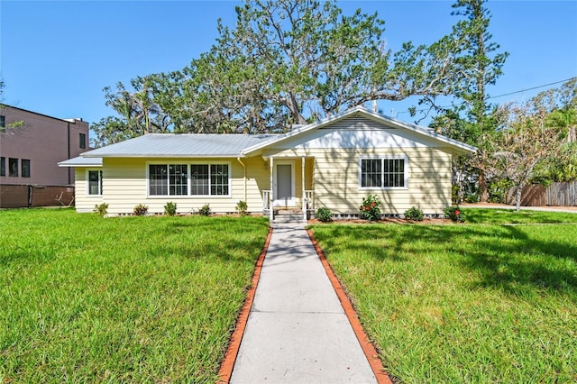 3001 Bay Shore Cir, Sarasota, FL 34234 - ranch-style house featuring metal roof