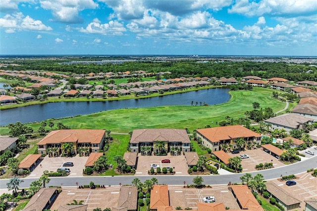 13609 Messina Loop Unit 104, Bradenton, FL 34211 - aerial perspective of suburban area featuring a large body of water and a local golf course