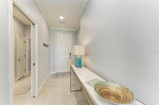 13609 Messina Loop Unit 104, Bradenton, FL 34211 - doorway with crown molding and baseboards