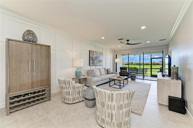 13609 Messina Loop Unit 104, Bradenton, FL 34211 - living room featuring ornamental molding, ceiling fan, light tile patterned flooring, recessed lighting, and baseboards